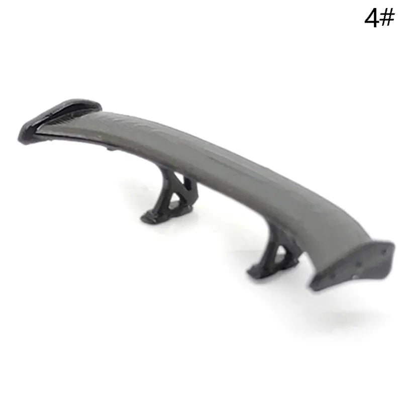 Simples Market 1:64 scale rear spoiler wing for model cars in gray with black end plates and mounting supports