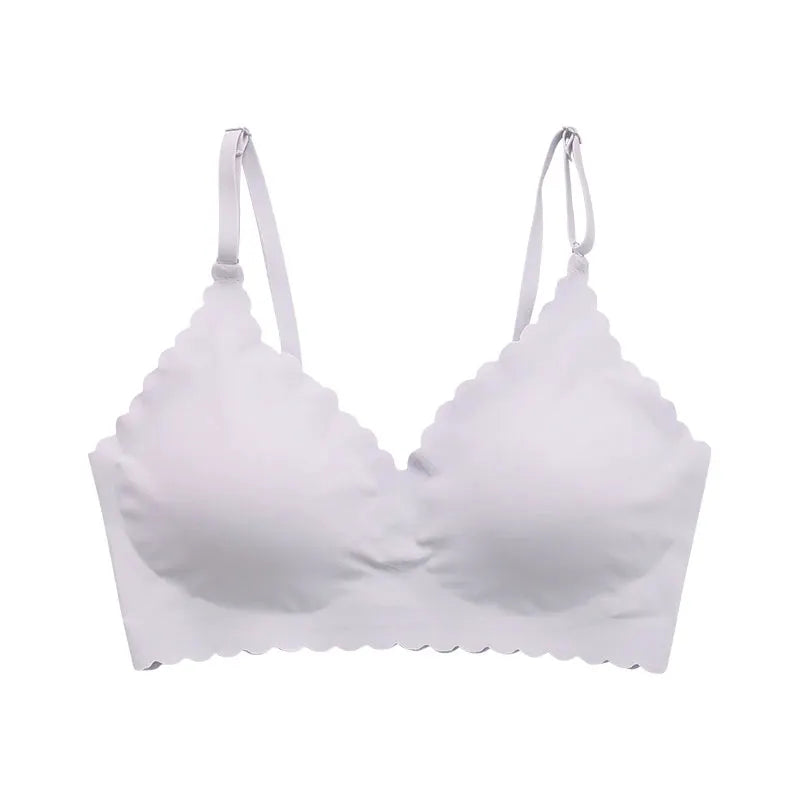 Wireless padded bra with scalloped wavy edge, white seamless design.