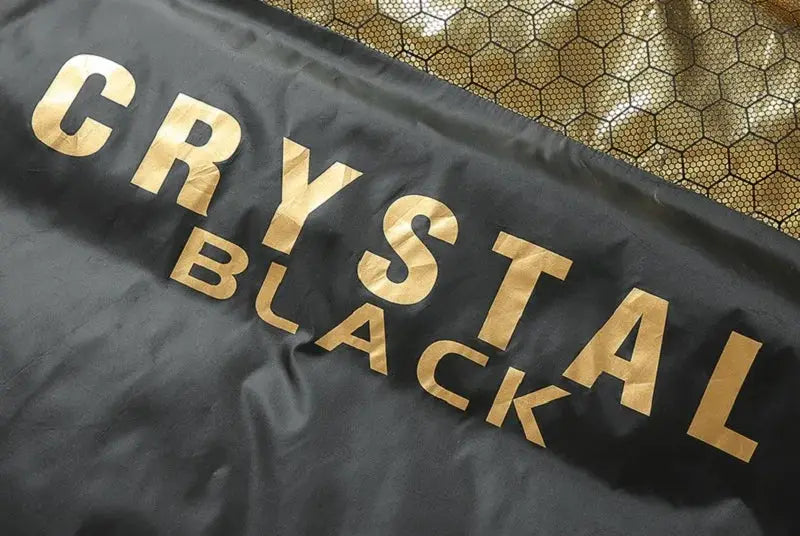 Winter black puffer jacket with Crystal Black gold logo on fabric
