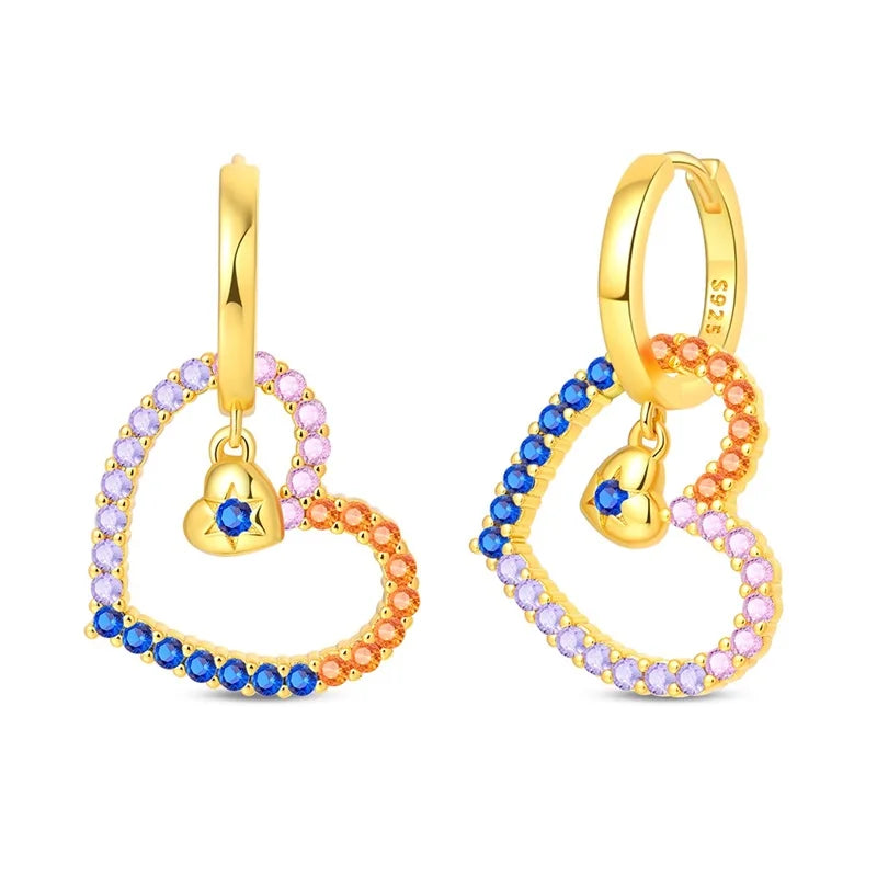 Pair of gold-tone heart hoop earrings with multicolor rainbow stones and tiny gold heart charm.