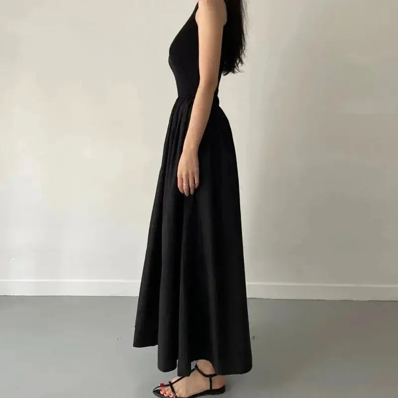 EleganceLane Black Round Neck Sleeveless Long Dress For Women High Waist Flattering Silhouette And Effortless Comfort