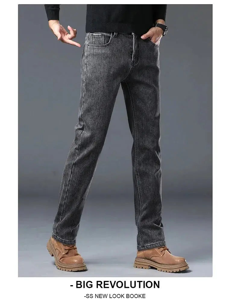 Men's gray-washed winter-warm jeans, slim-straight denim pants with tan boots.