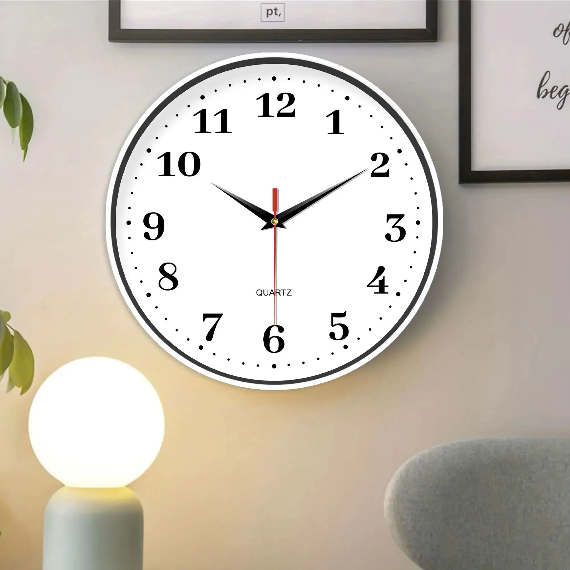 8-inch white modern wall clock with bold black numerals, black hands and a red second hand; quartz