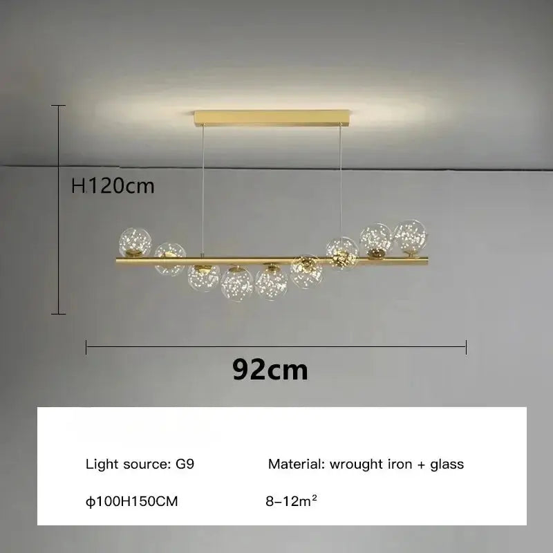 Nordic ceiling chandelier by Simples Market; gold bar with glass globe bulbs