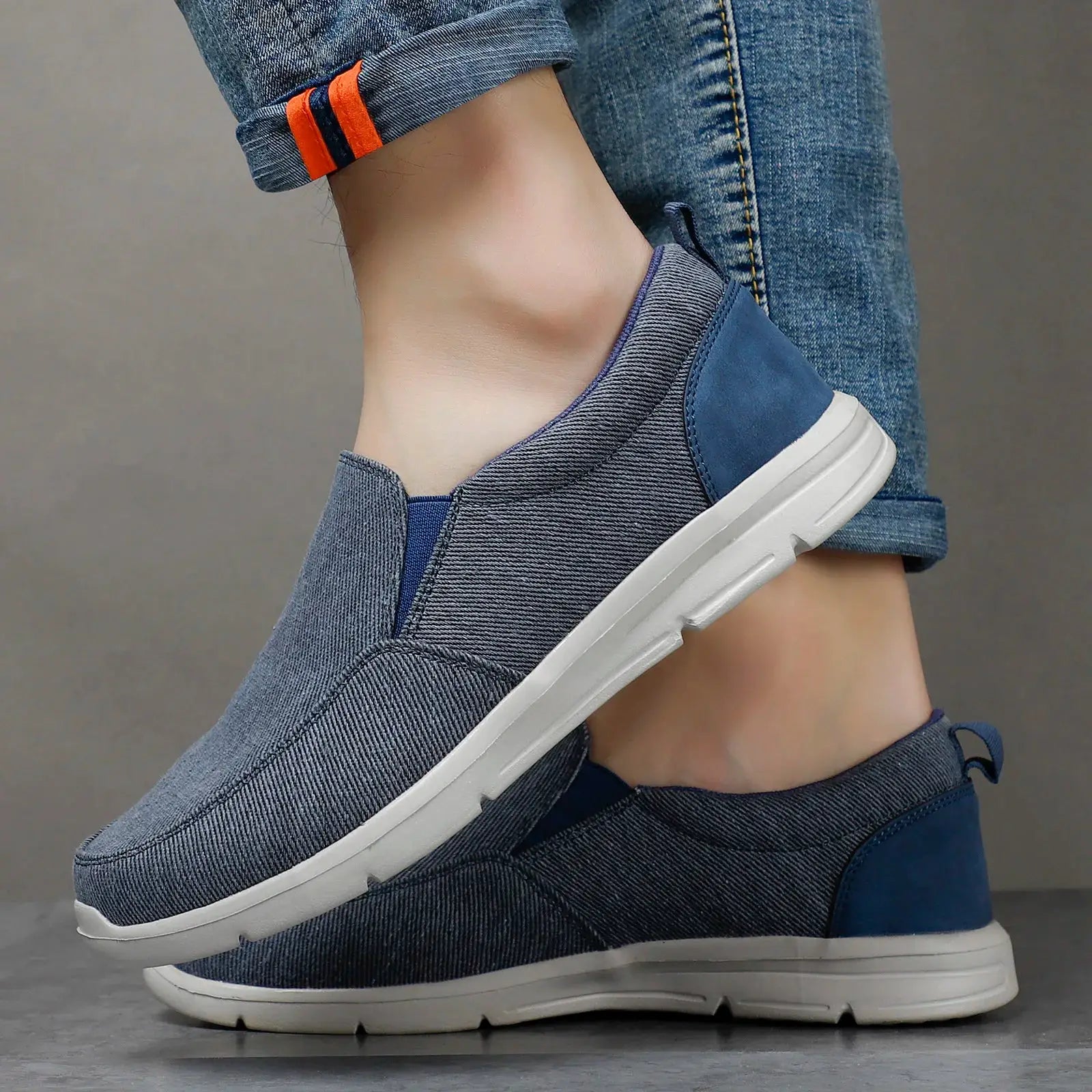 Men's blue denim canvas slip-on sneakers with white sole