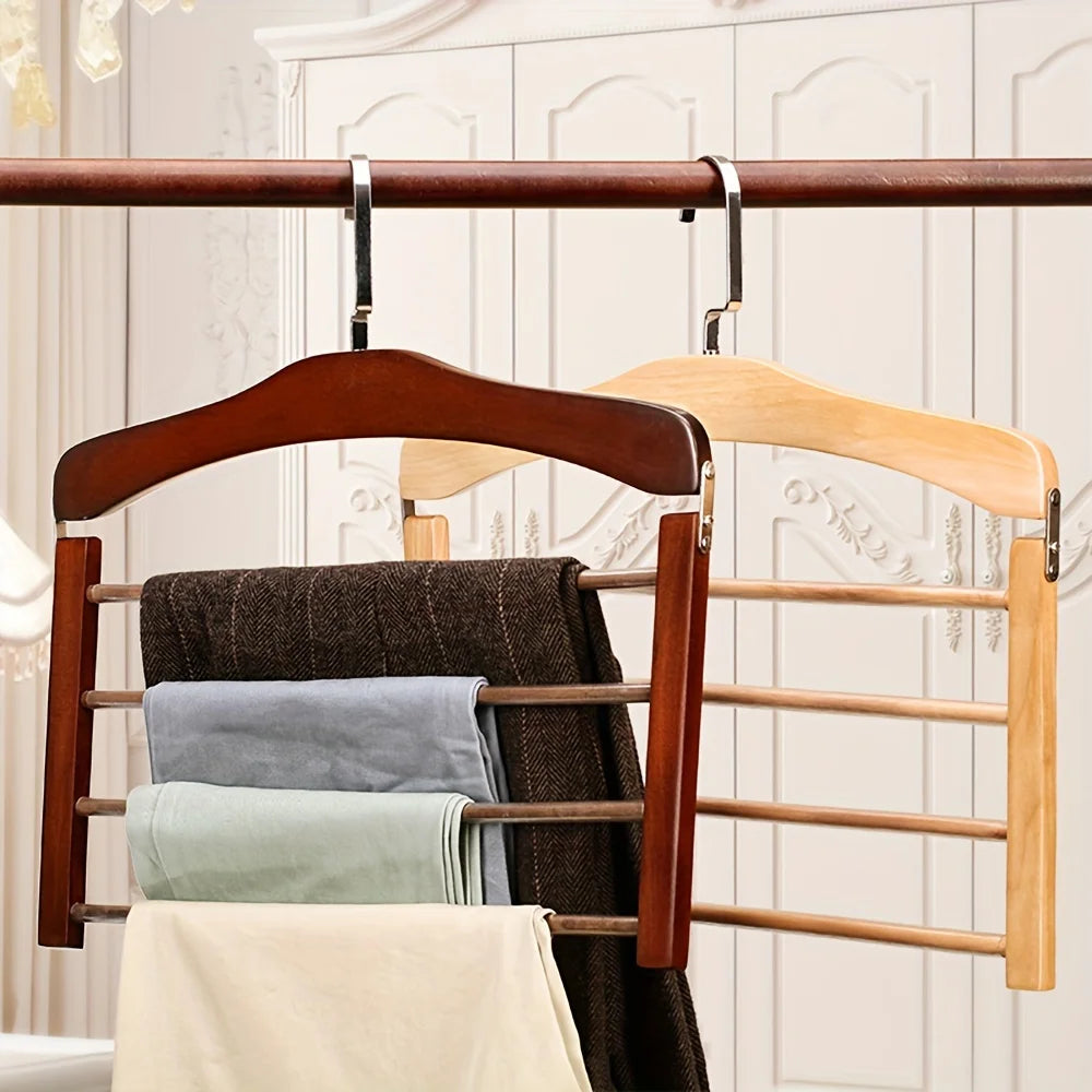 Pair of solid wood multifunctional multi-tier trouser racks with dark and light panels, hung on a closet rod.