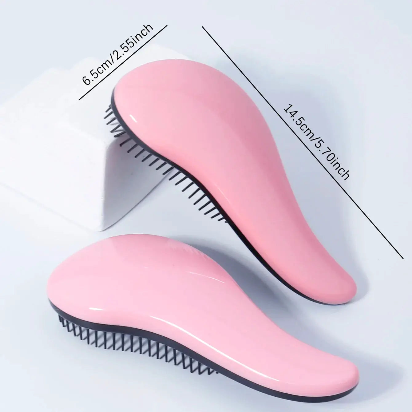 Simples Market 2-pack pink antistatic massage brushes with curved ergonomic handles and black bristles