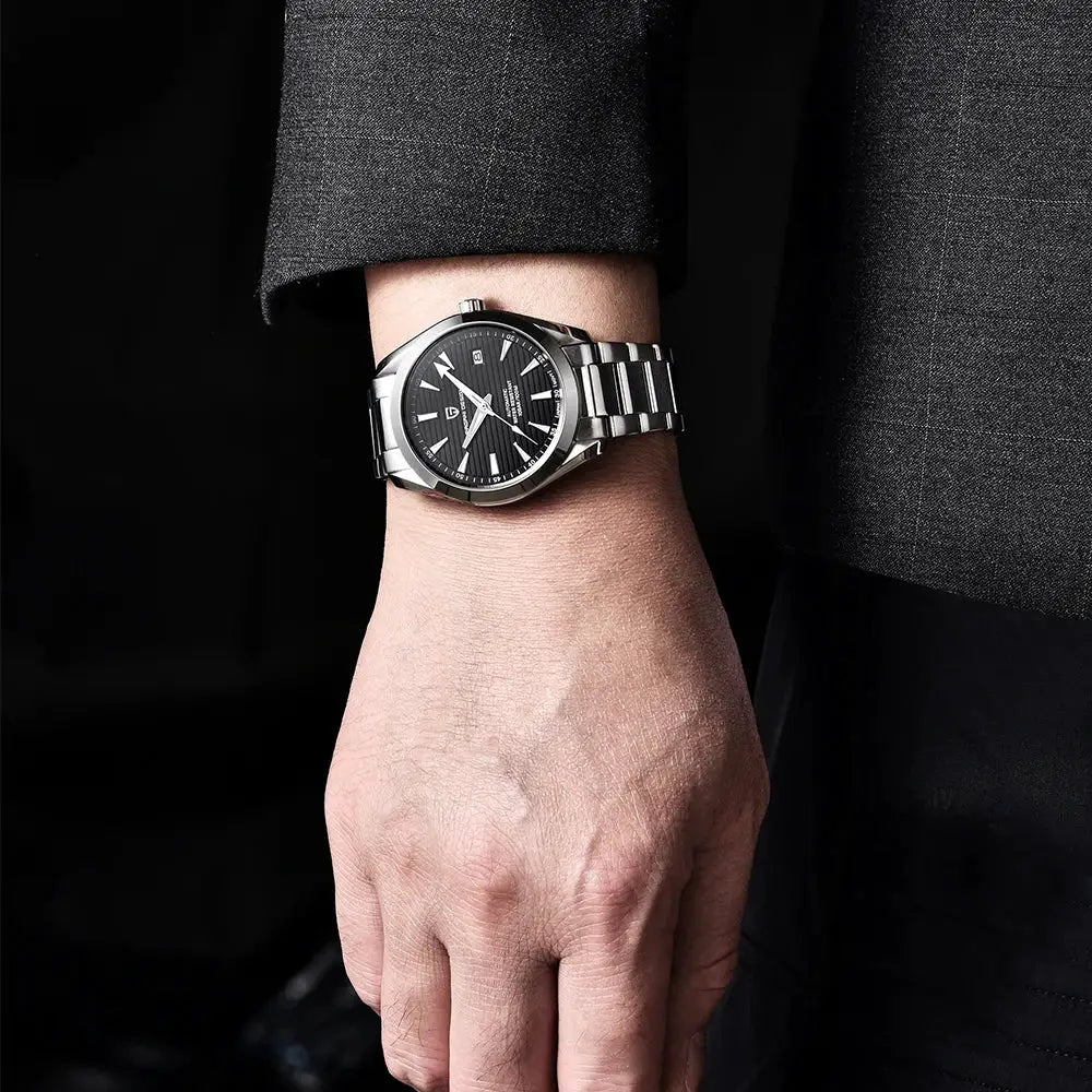 Pagani Design A150 40mm men's stainless steel automatic watch on wrist with black dial and silver bracelet.