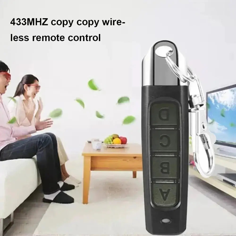 433MHz remote key fob for garage door opener, black body with four labeled buttons and a silver top.
