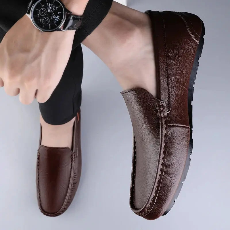 Men's brown genuine leather slip-on loafers with moccasin stitching