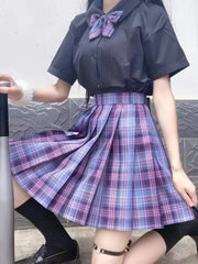 ZOKI plaid pleated skirt with matching bow-tie blouse; black top, purple plaid bow, high-waist A-line mini set.