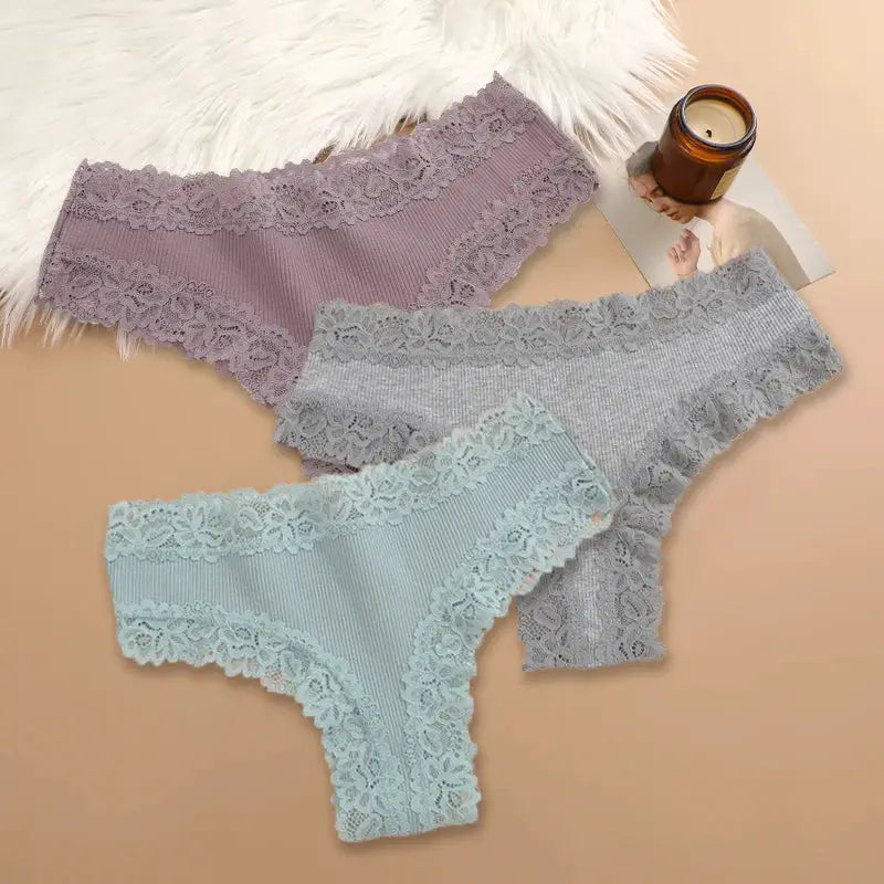 Three-piece set of women's cotton lace panties in lilac, gray, and mint blue with floral lace trim; soft briefs in S-XL