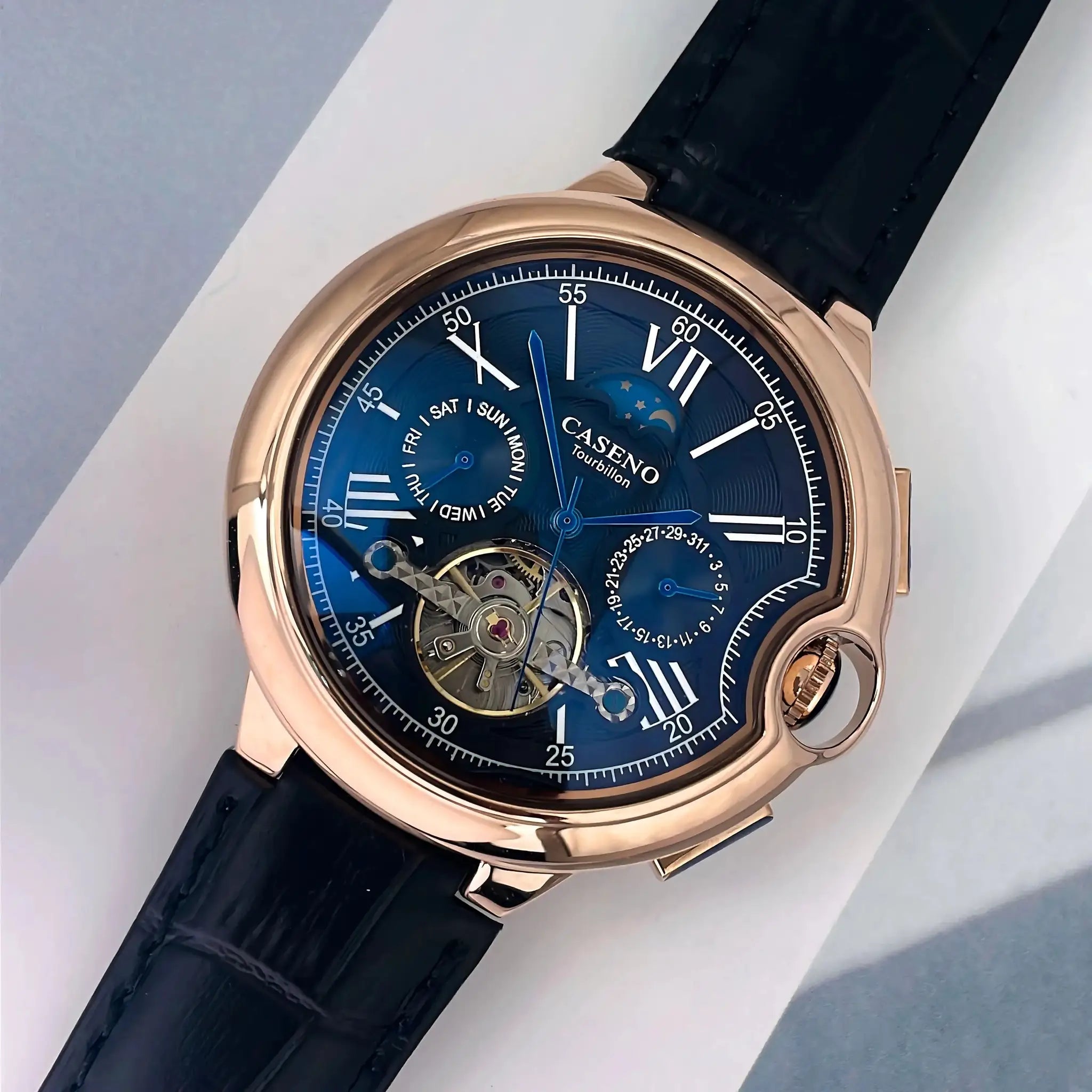 CASENO Star Roman Grand men's fully automatic tourbillon watch, rose-gold case, blue dial, black strap.