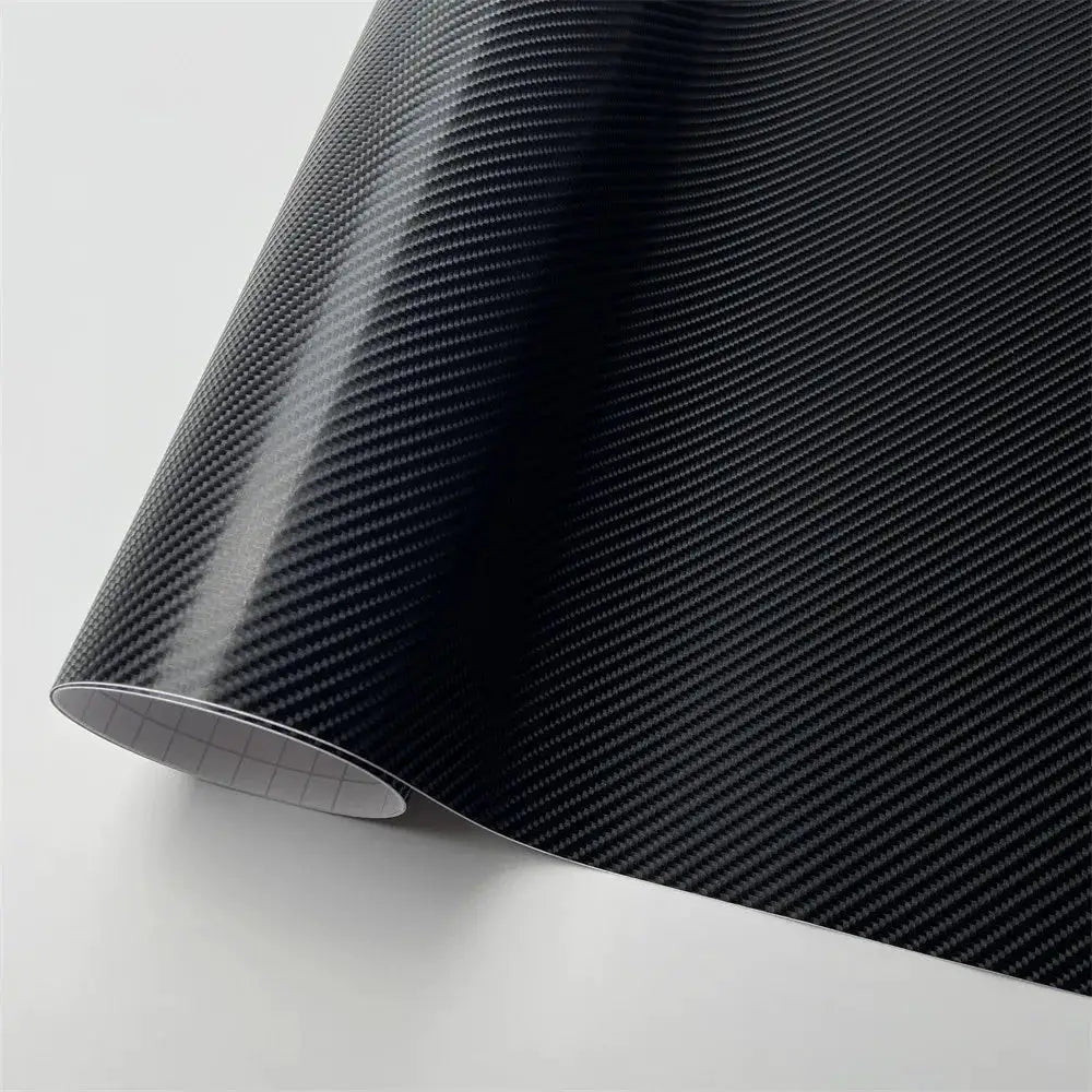 Black carbon fiber vinyl wrap film by Simples Market with air release channels for motorcycles