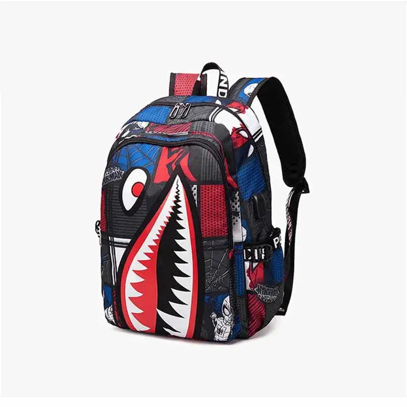 Backpack elementary bookbag with cartoon shark print; blue, red and black panels, kids’ school bag by Simples Market.