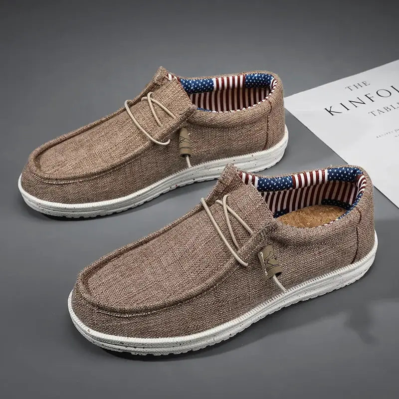 Mens casual canvas loafers brown with white sole; breathable lining with American flag stripes; 2 shoes