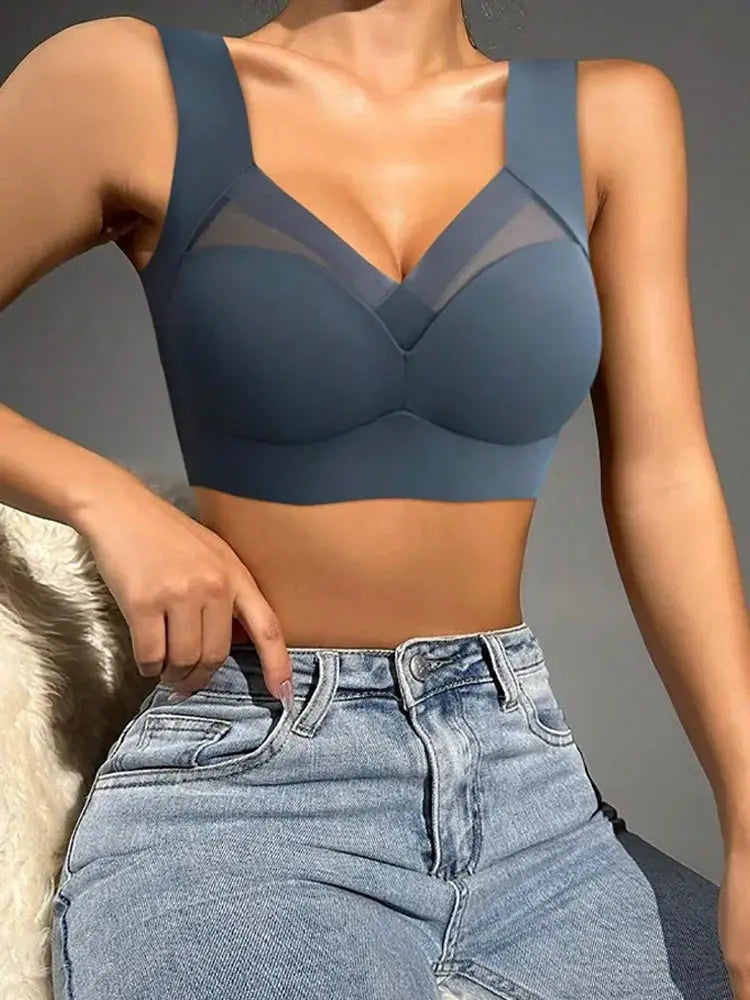 Plus-size blue-gray seamless wireless sports bra with mesh cup panels for women