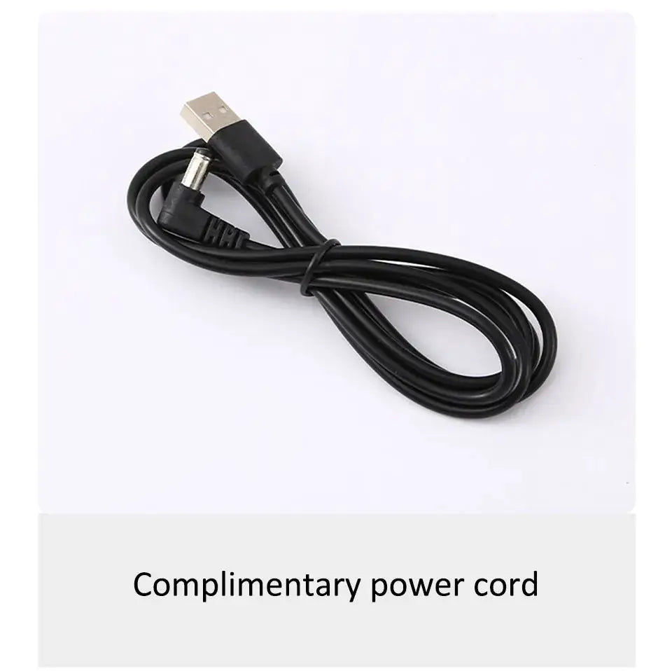 Power cord, complimentary black USB-A to DC barrel plug, coiled