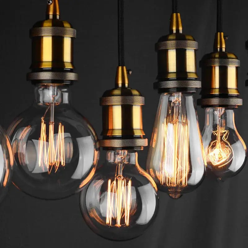 Simples Market retro Edison bulbs set with brass pendant fixtures, warm amber glow
