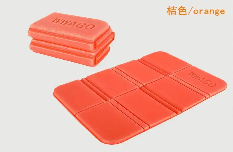 Two orange foldable XPE foam outdoor mats by Simples Market; moistureproof picnic and camping seat cushions