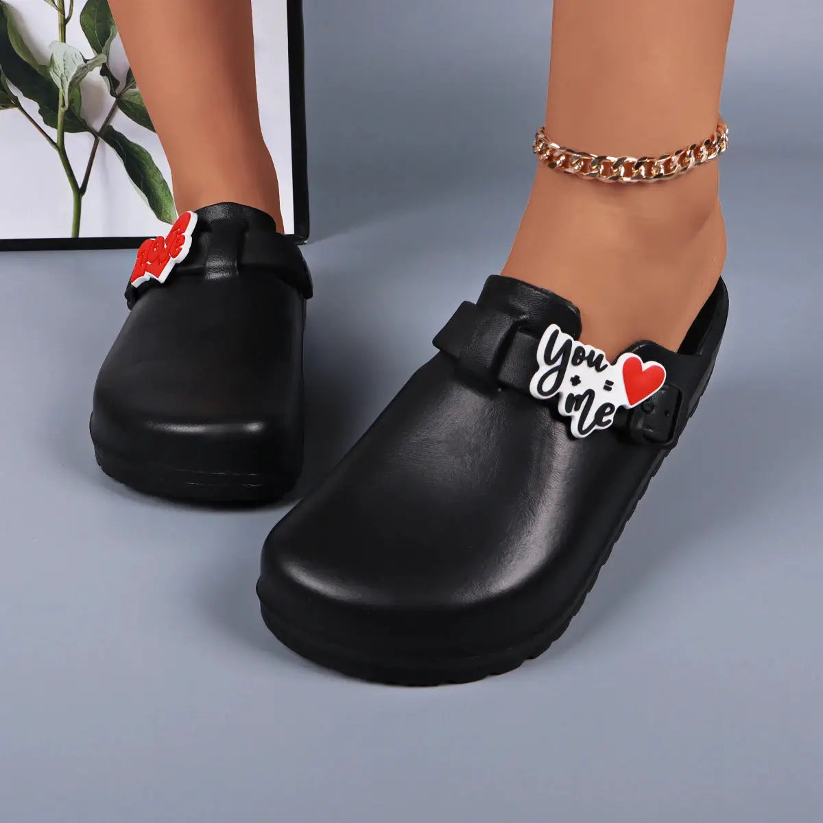 Spring&Summer EVA slides for women, black indoor/outdoor sandals with You & Me heart charm and red flower charm.