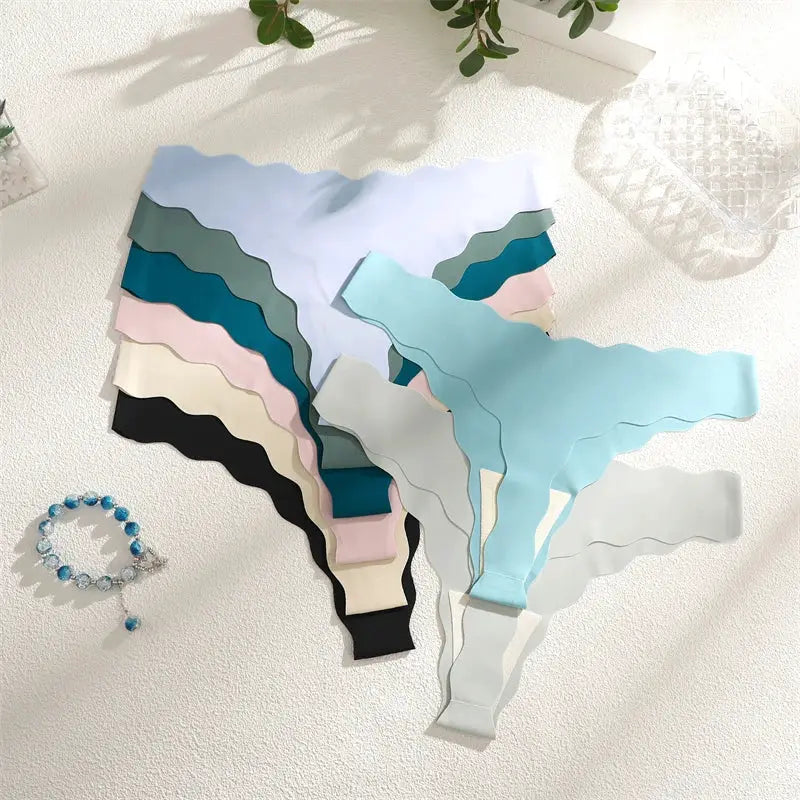 4pc seamless thong underwear set in pastel colors; low-rise T-back, ultra-soft breathable fabric