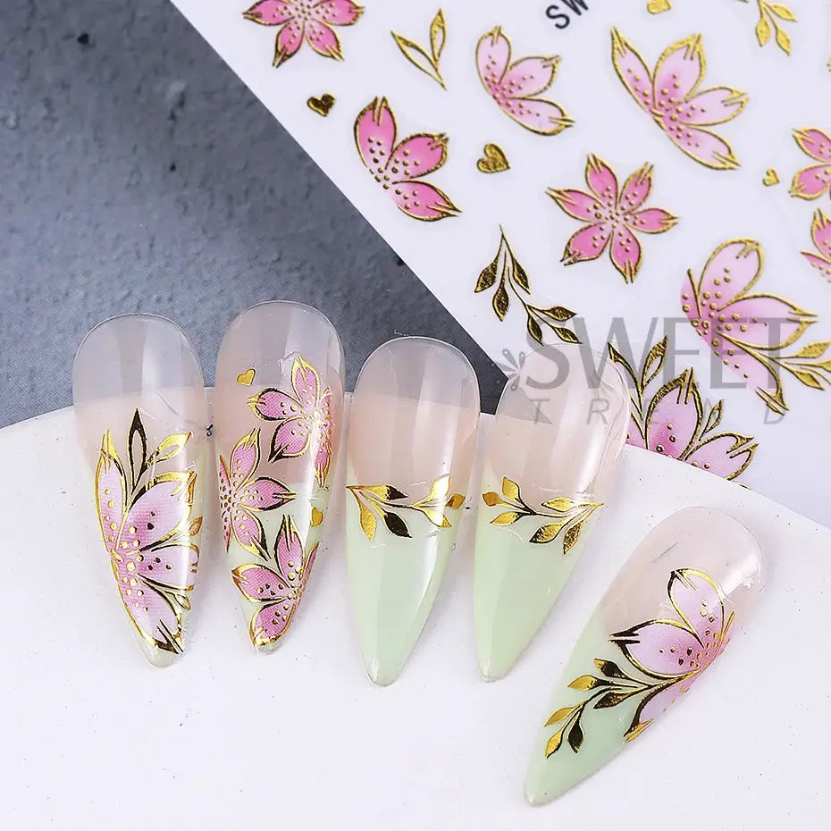 Simples Market 2-3pc golden pink hibiscus nail decals with gold bronzing border on pastel green tips