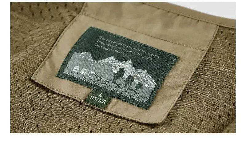 Men's sleeveless vest by Simples Market in khaki breathable mesh with multiple pockets and inner mountain patch