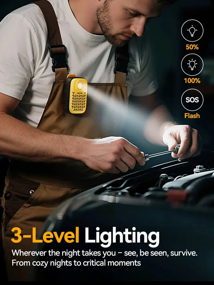 Joyroom wearable Bluetooth speaker clipped to a brown work strap; yellow, compact clip-on personal speaker