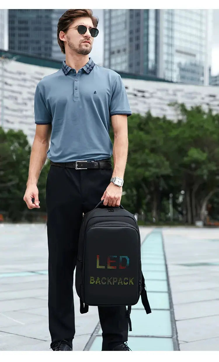 LED display backpack, black 15.6-inch laptop backpack with multicolor LED text.