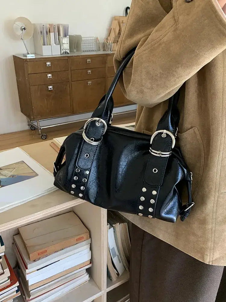 Shoulder bag black PU leather with rivet-detailed panels and silver hardware