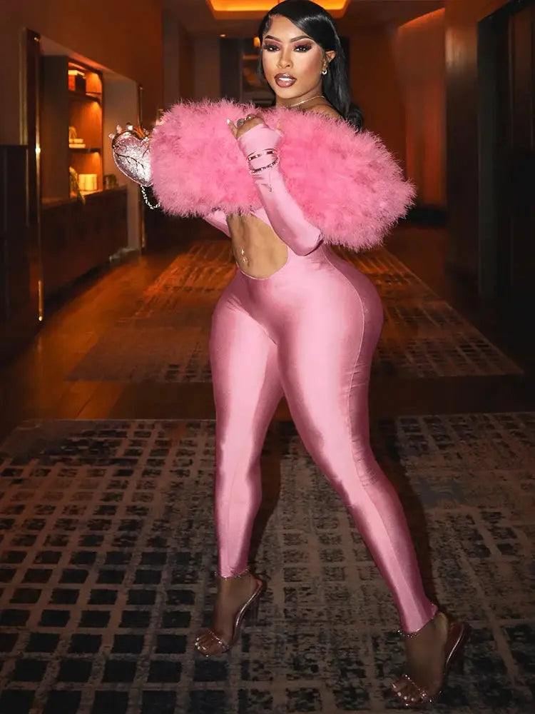 Sisterlinda pink furry slash-neck jumpsuit with open back in glossy stretch fabric