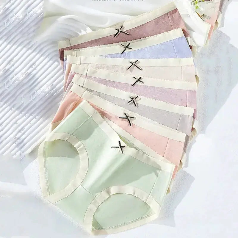 7Pcs Simples Market women's cotton panties set in pastel colors with bow accents, breathable low-rise briefs.