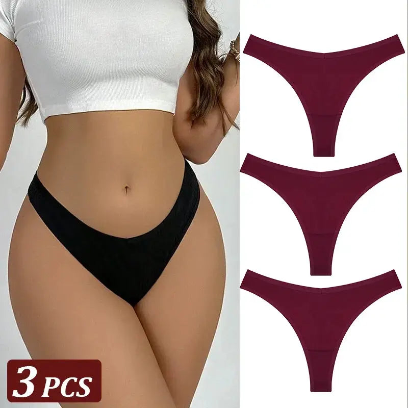 Simples Market 3-piece seamless cotton thong set; black thong worn by model with three burgundy low-rise T-back panties.