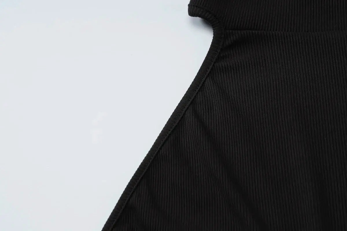 Hugcitar ribbed halter backless black jumpsuit fabric close-up with seam detail