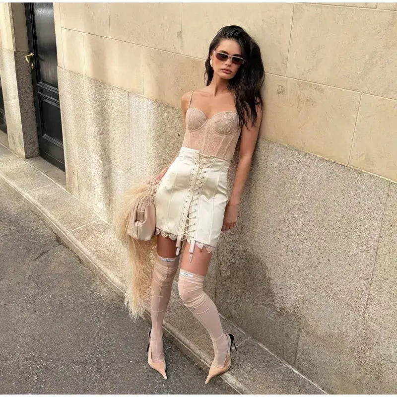 Simples Market cream satin lace-up front women's skirt with lace trim.