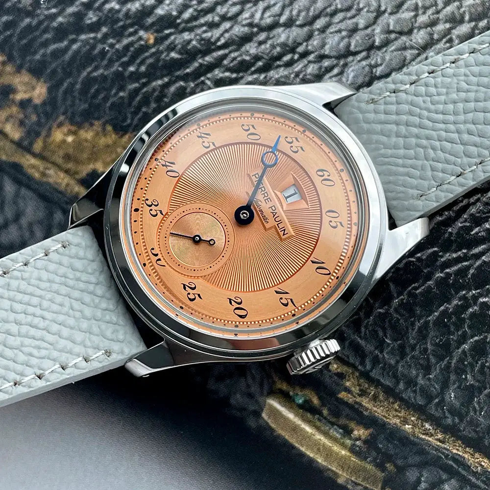 Pierre Paulin Jumping Hour men's watch with salmon dial, stainless steel case, light gray leather strap