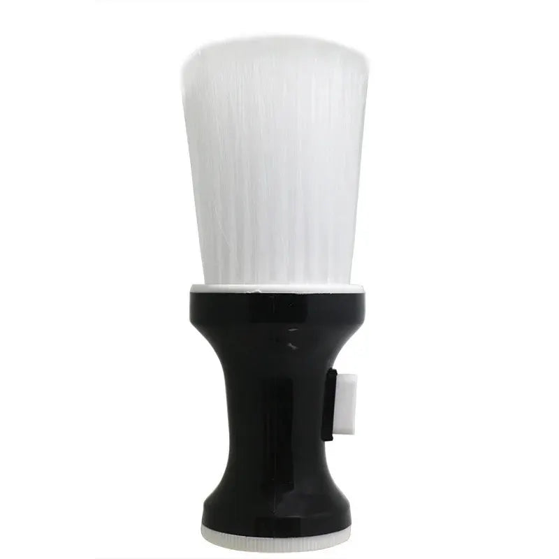 Neck and face duster brush with white bristles and a black ergonomic handle