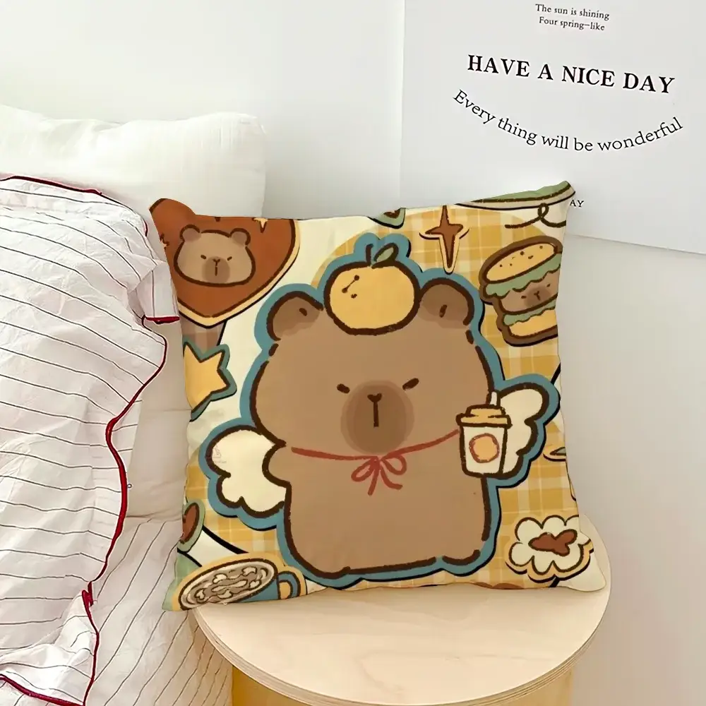 Capybara cartoon pillow case; square cushion with a brown capybara, chick on head, holding a cup on yellow plaid print