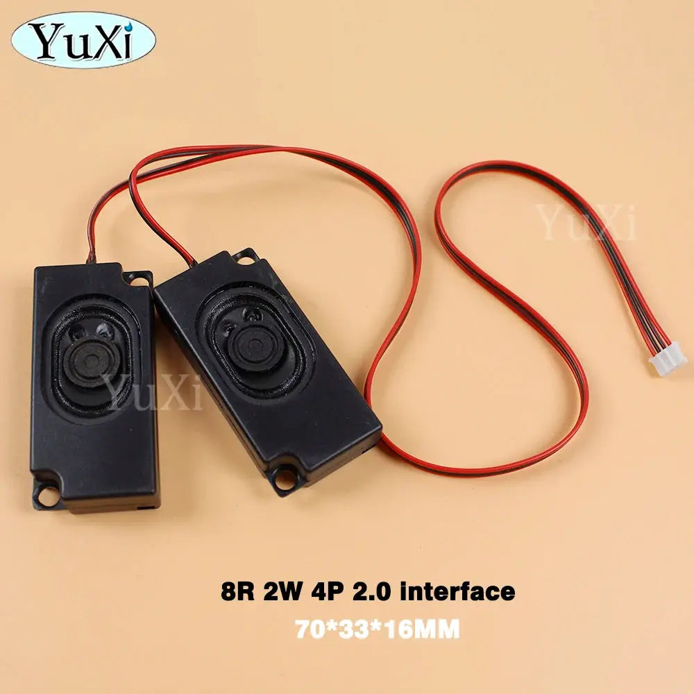 Pair of black rectangular PC speakers with red/black power leads and a white 2-pin connector; YuXi logo