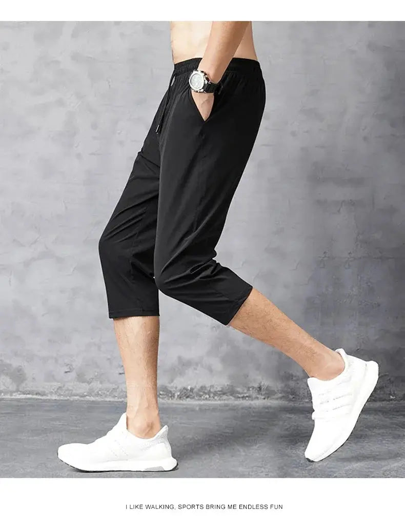 3/4 length men's shorts by Simples Market, black quick-dry nylon with elastic waist