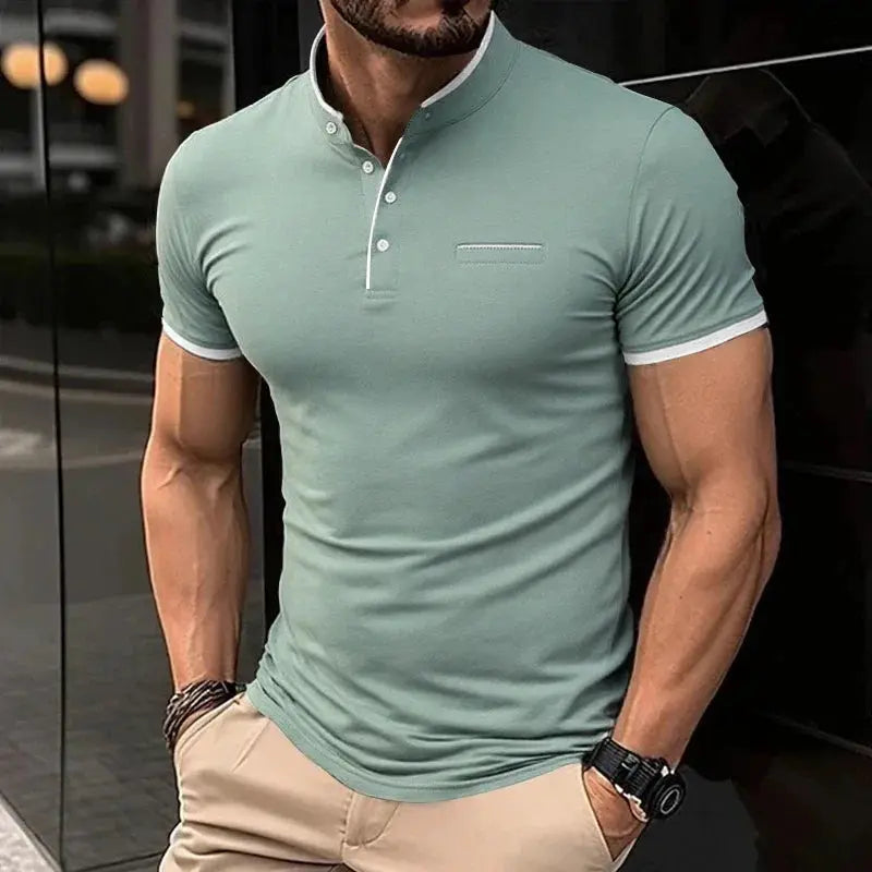 Men's polo shirt with stand-up collar, sage green with white trim, short sleeves and chest pocket accent