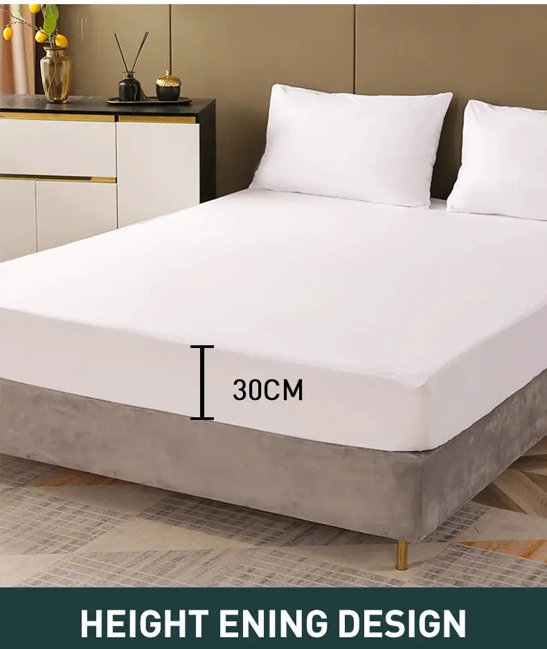 Waterproof mattress protector on white bed with fitted jersey cover; breathable, noiseless, 30 cm height