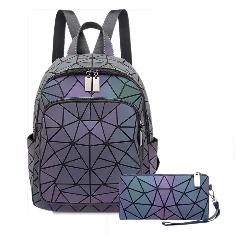 Backpack and matching wallet from Simples Market in luminous holographic geometric purple gradient PVC.