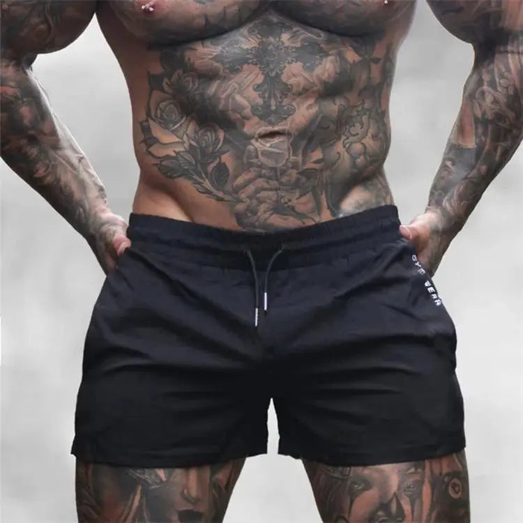 Men's black lightweight gym shorts with drawstring for running and fitness, quick-drying fabric.
