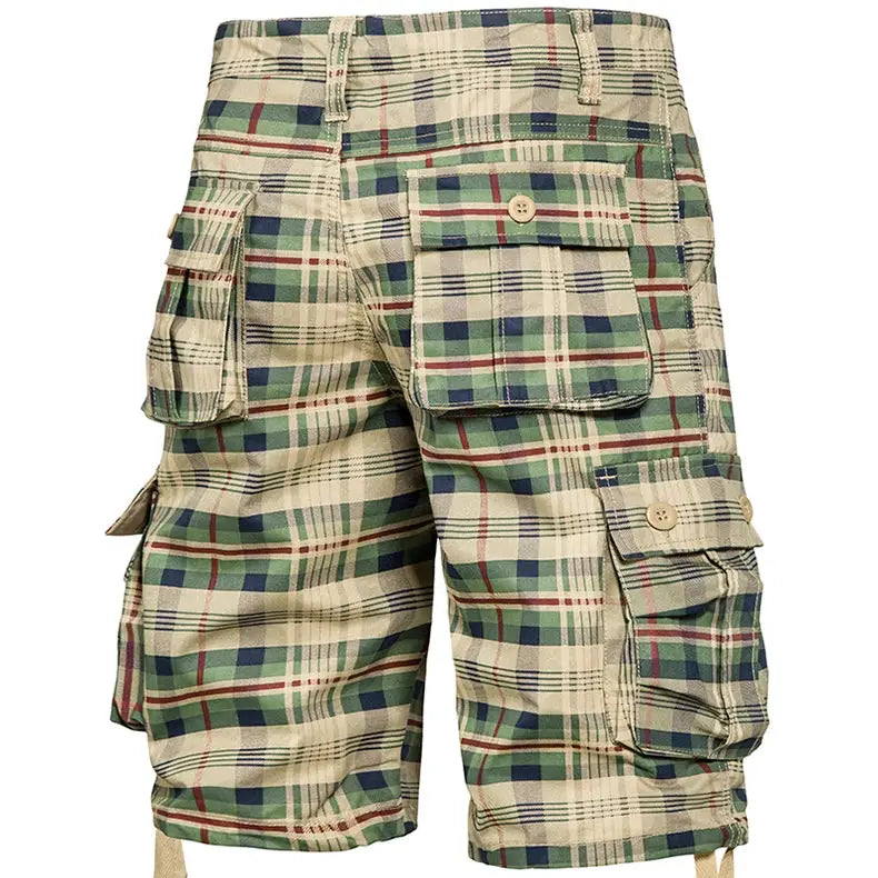 Men's plaid cargo shorts in beige with green, navy, and red accents; cotton fabric with multiple cargo pockets