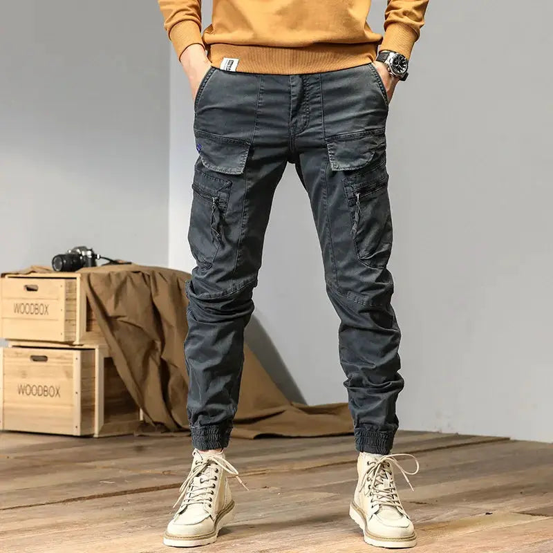 CAAYU gray joggers cargo pants for men with multiple pockets and zip pockets by Simples Market