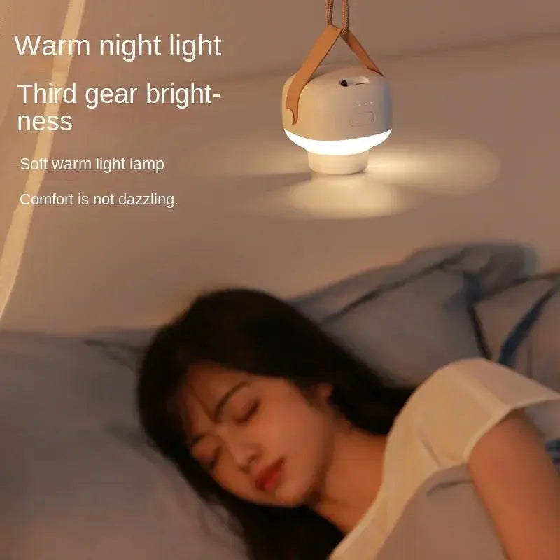 Portable wireless mini ceiling fan light by Simples Market; white with brown hanging strap, USB powered