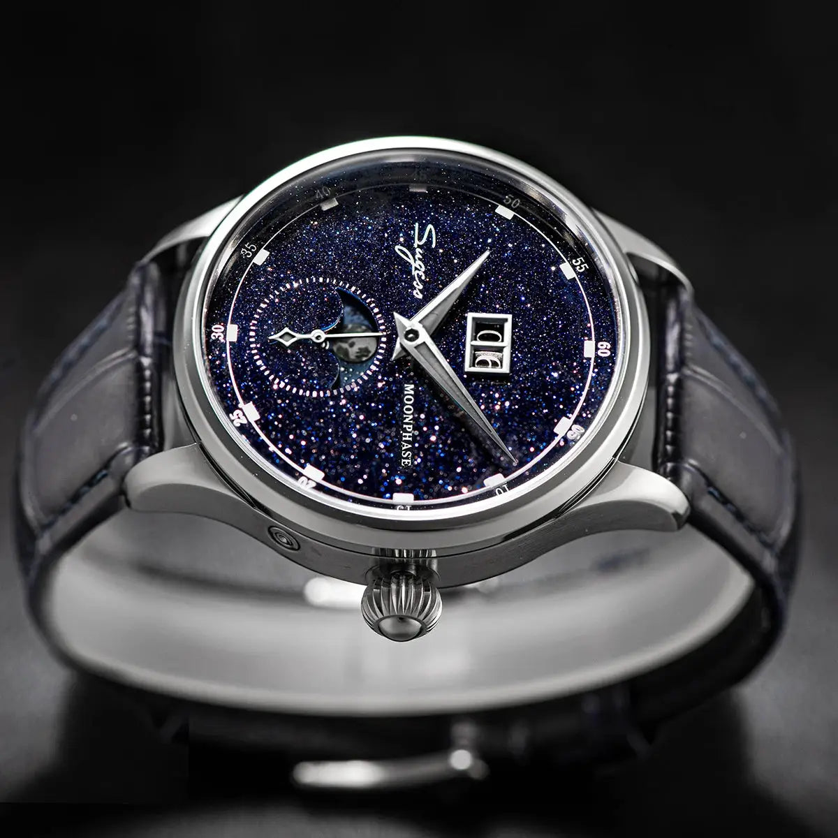 Sugess Moonphase 40mm automatic stainless steel watch with blue sandstone dial, moon phase display, and date window.