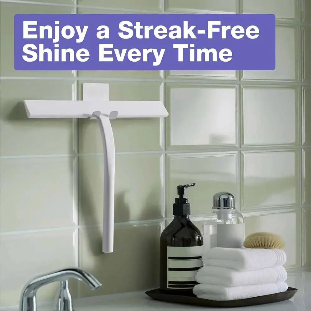 Shower squeegee with silicone holder by Simples Market mounted on white tiled bathroom wall